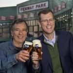 Boston Beer Co. founder Jim Koch (left) and Red Sox chief executive Sam Kennedy toasted over the new deal.